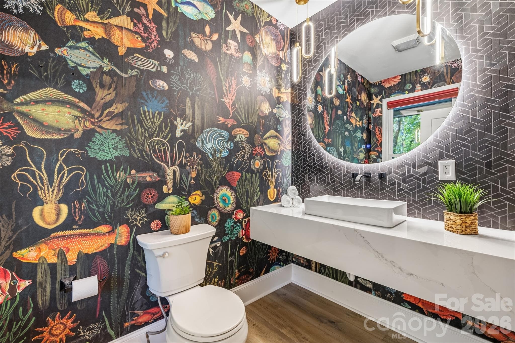 Playful powder room because why not? Modern finishes with wall mounted vanity & faucet - 16 Tanglewood Road, Lake Wylie