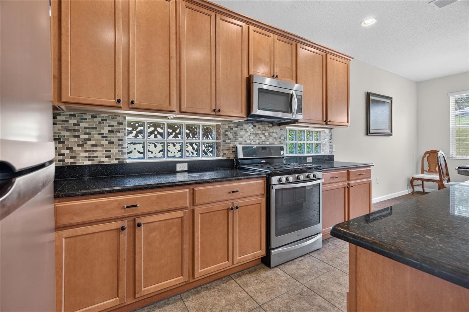 Kitchen with granite countertops - 2315 NATOMA BLVD, MOUNT DORA