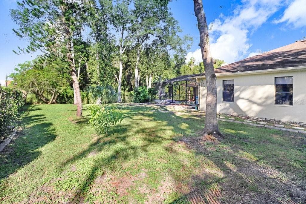Single Family Residence at 8705 CRESCENT FOREST BLVD, NEW PORT RICHEY, photo 7 of 66
