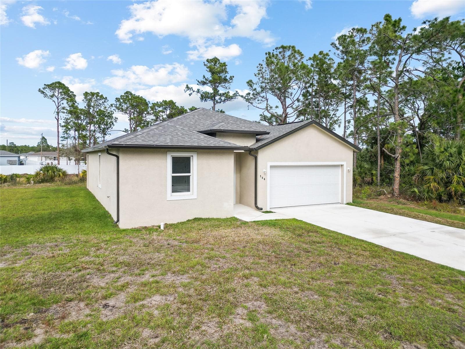 Single Family Residence at 566 WOODVIEW DR, LEHIGH ACRES, photo 2 of 31