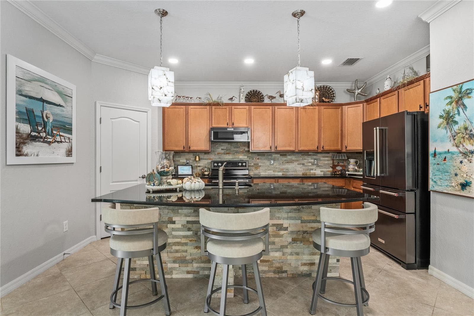 Kitchen with large island and beautiful lighting - 7122 MARSH VIEW TER, BRADENTON