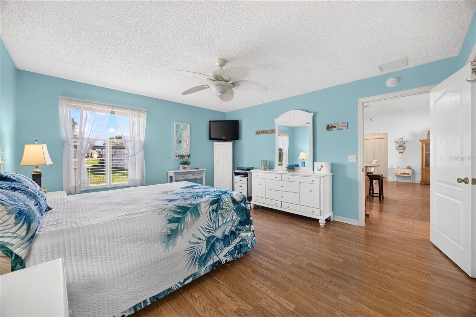 Primary Bedroom with Window - 17739 SE 89TH KEATING TER, THE VILLAGES