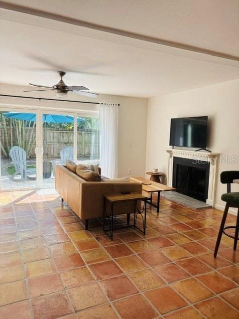Warm & welcoming living area with wood burning fireplace - 104 CHESAPEAKE AVE #C6, TAMPA