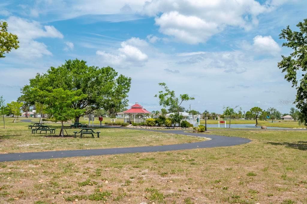 Walking path around the lake - 25416 PRADA DR, PUNTA GORDA