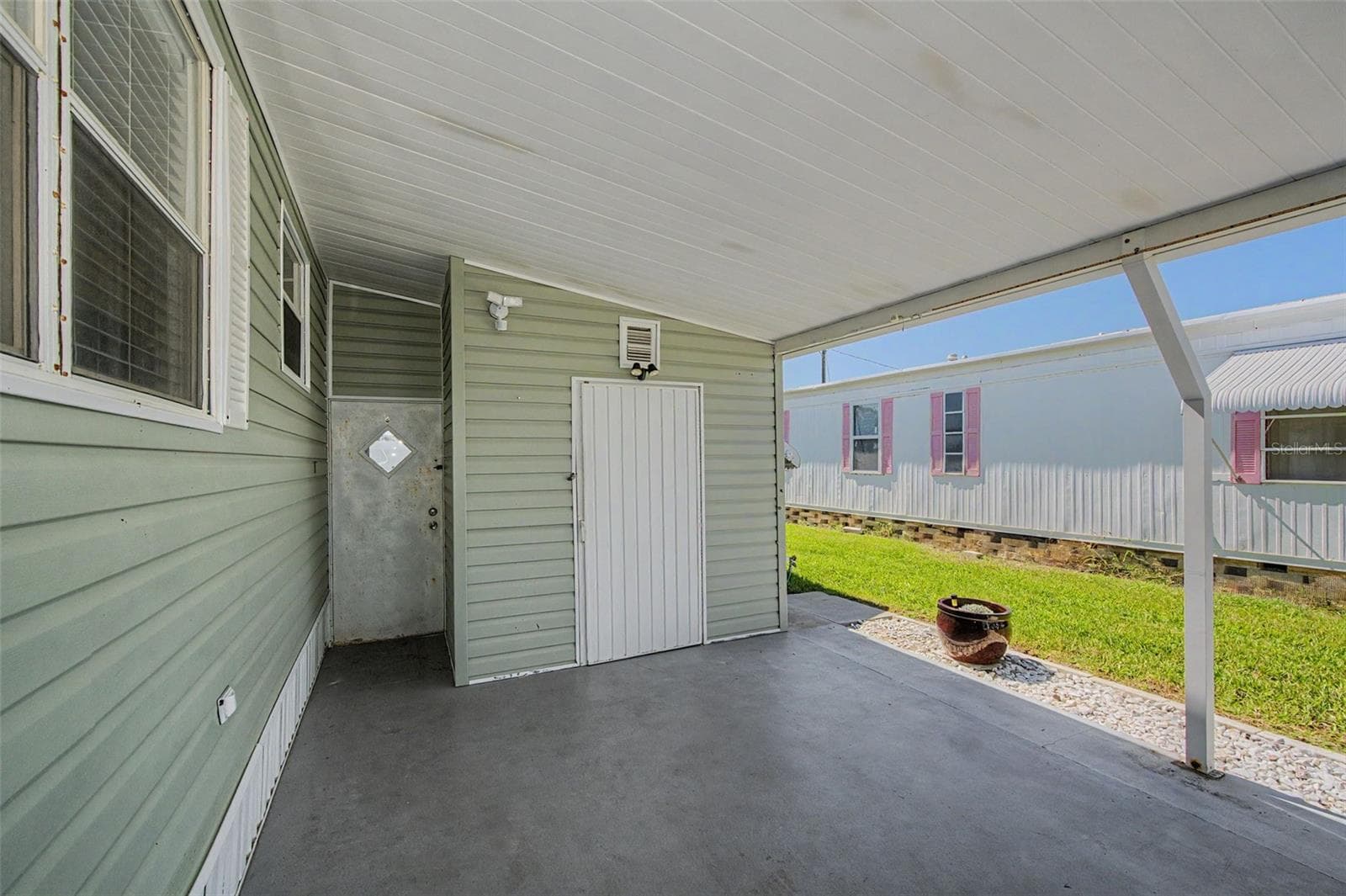 Mobile Home at 18 DRURY LN, TARPON SPRINGS, photo 31 of 84