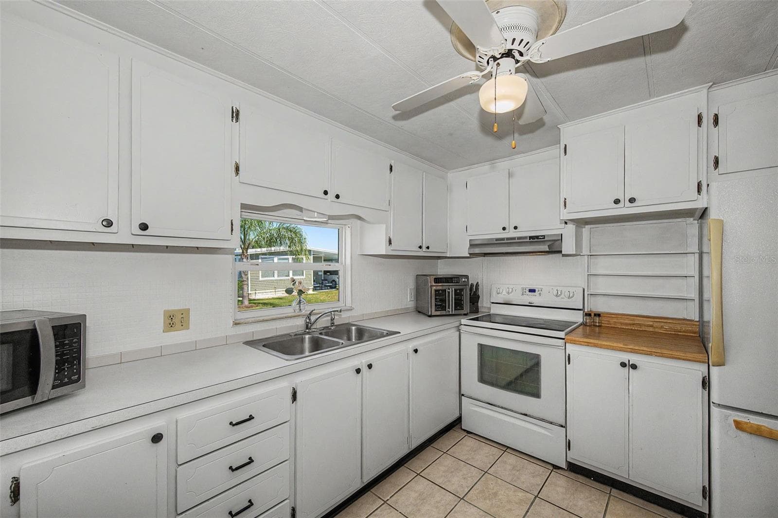 Mobile Home at 18 DRURY LN, TARPON SPRINGS, photo 21 of 84