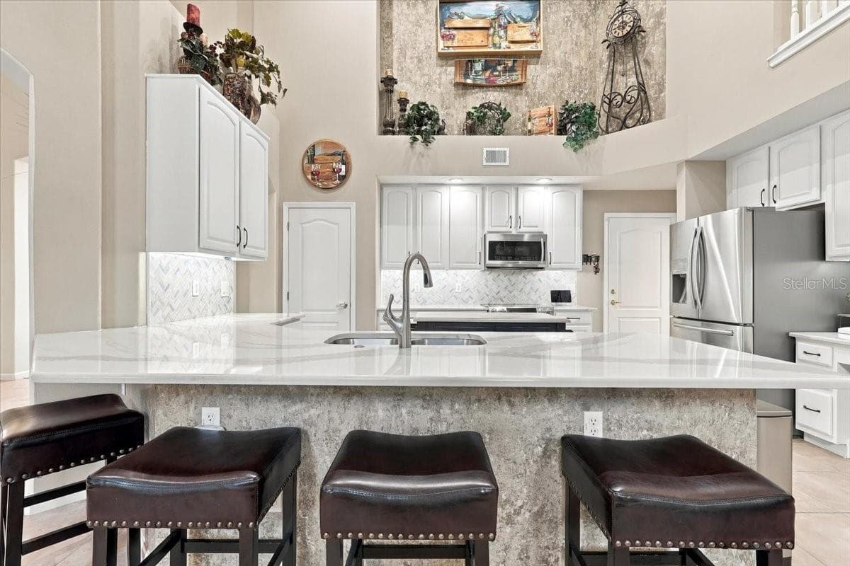 Entertain in the chef's kitchen. - 2631 TREYMORE DR, ORLANDO