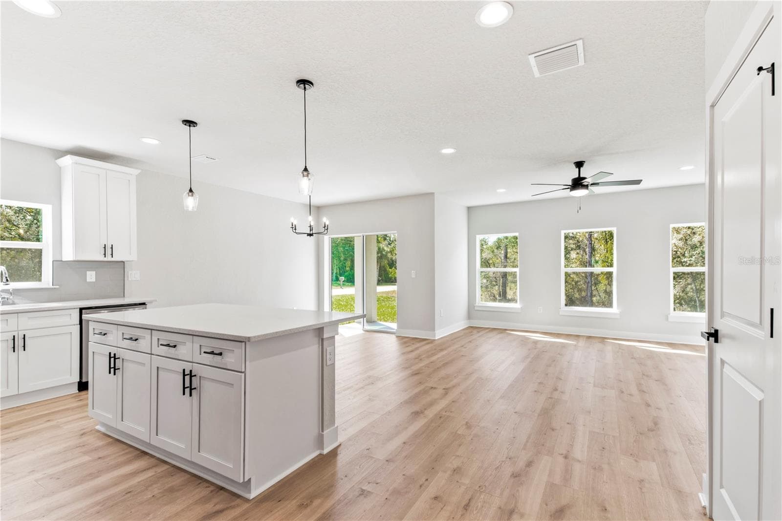 Kitchen, Dining, Living - 13290 SNOWY PLOVER AVE, WEEKI WACHEE