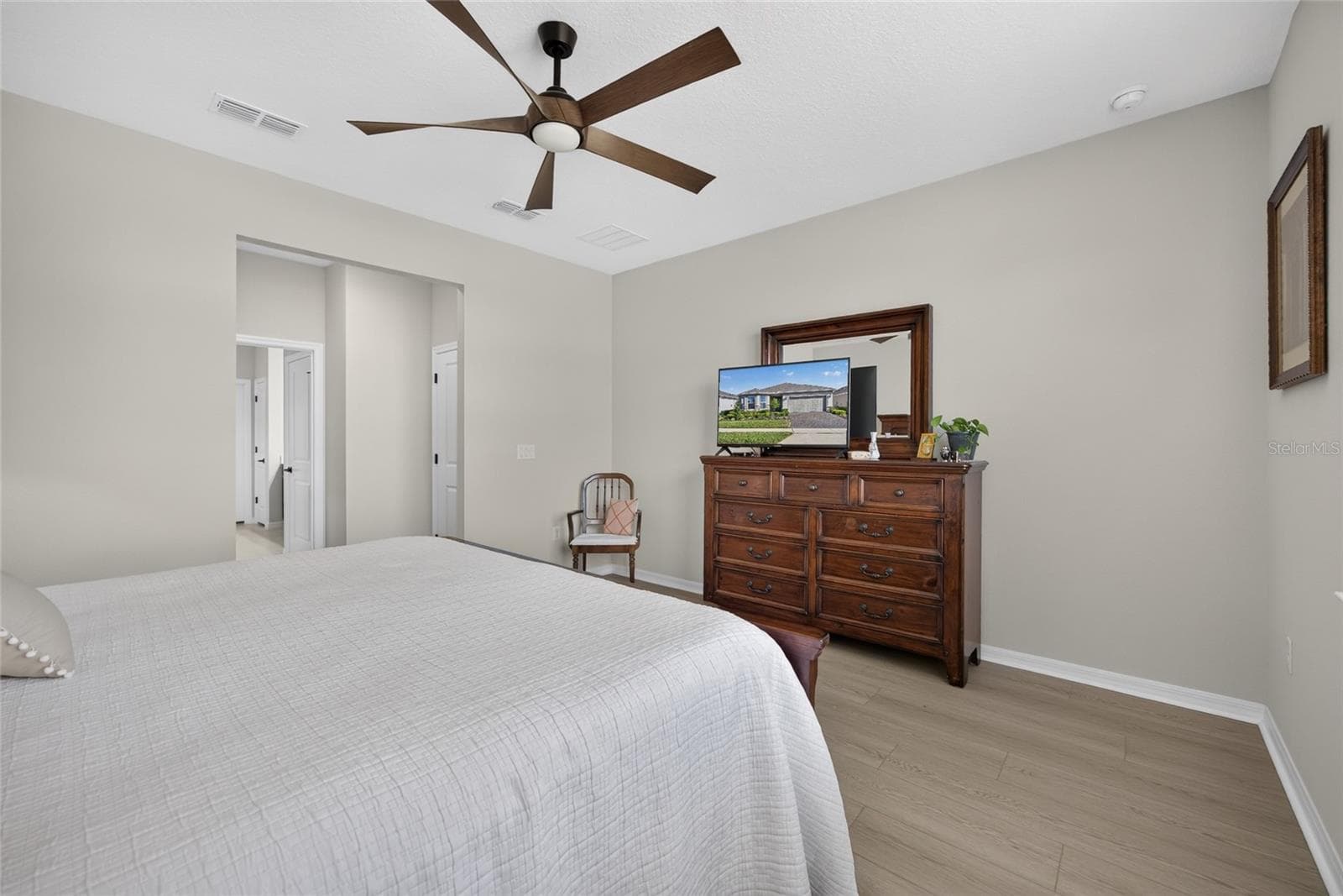Primary Bedroom - Stunning Luxury Vinyl Flooring - 2605 DEL WEBB DR, MINNEOLA