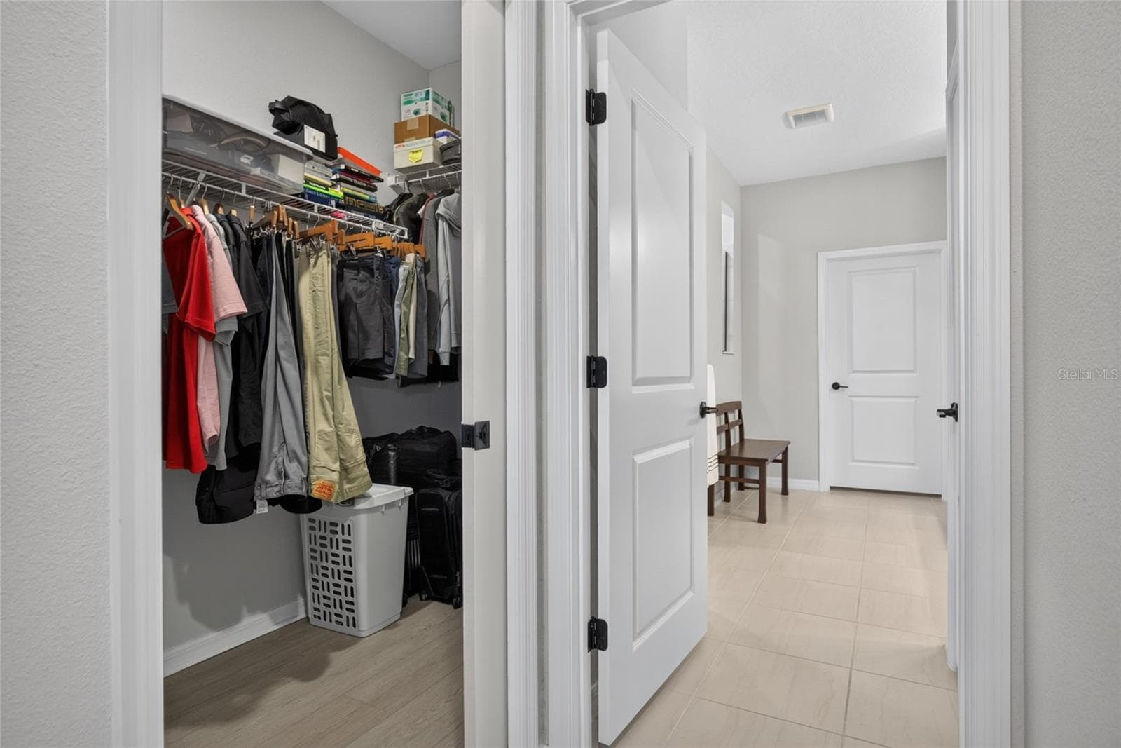 Second Walk-In Closet with Pocket Door in Primary - 2605 DEL WEBB DR, MINNEOLA