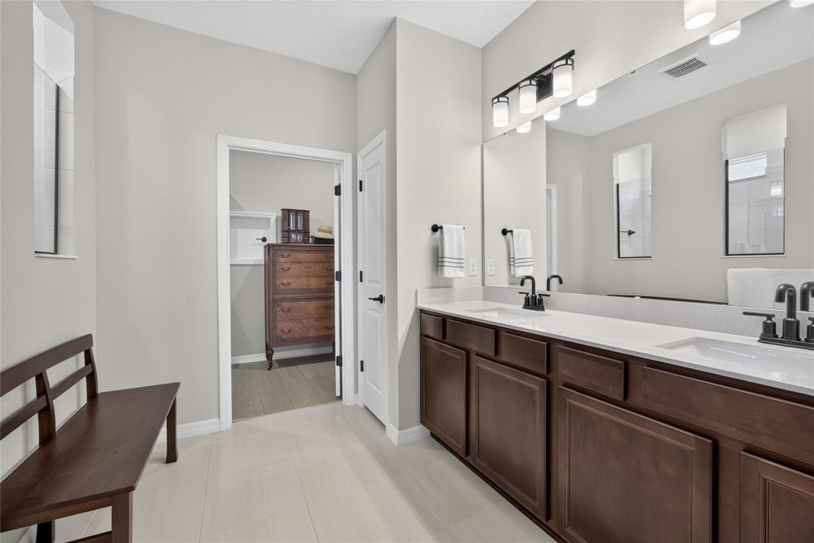 Double Vanity in Primary Bathroom PLUS 2 Walk-In Closets - 2605 DEL WEBB DR, MINNEOLA