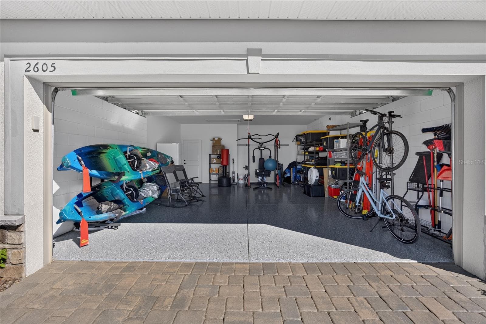 Garage: Epoxy-Finished Floor - 4' Extension - Pull-Down Stairs - 2605 DEL WEBB DR, MINNEOLA