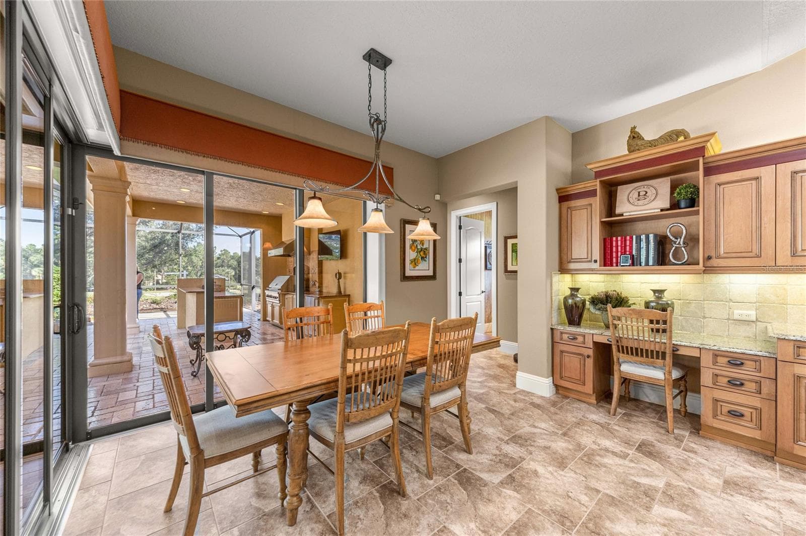 Bright dining area with corner sliding glass doors - 6501 SW 179TH AVENUE RD, DUNNELLON