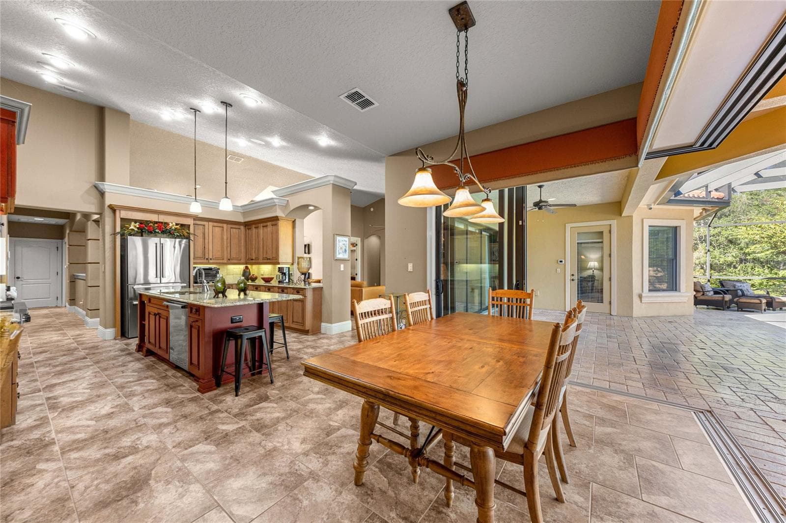 Open concept kitchen and dining area - 6501 SW 179TH AVENUE RD, DUNNELLON