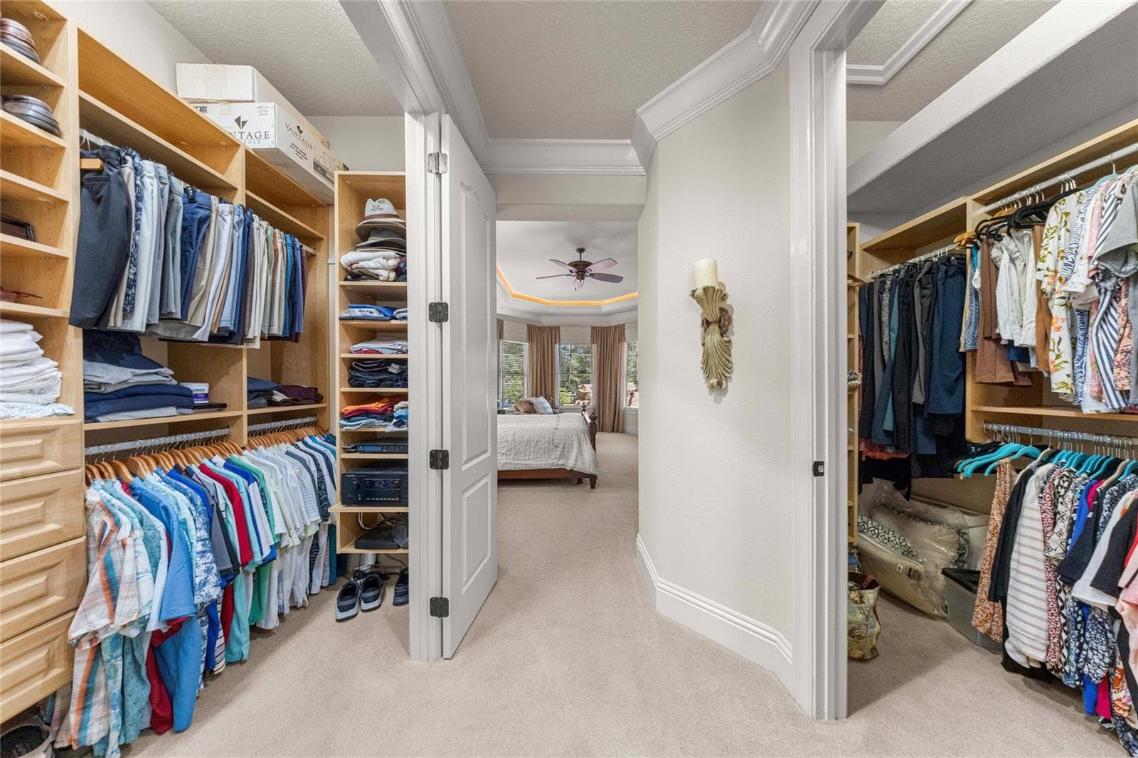 Two spacious walk-in closets with built-in shelving and storage provide exceptional organization. - 6501 SW 179TH AVENUE RD, DUNNELLON