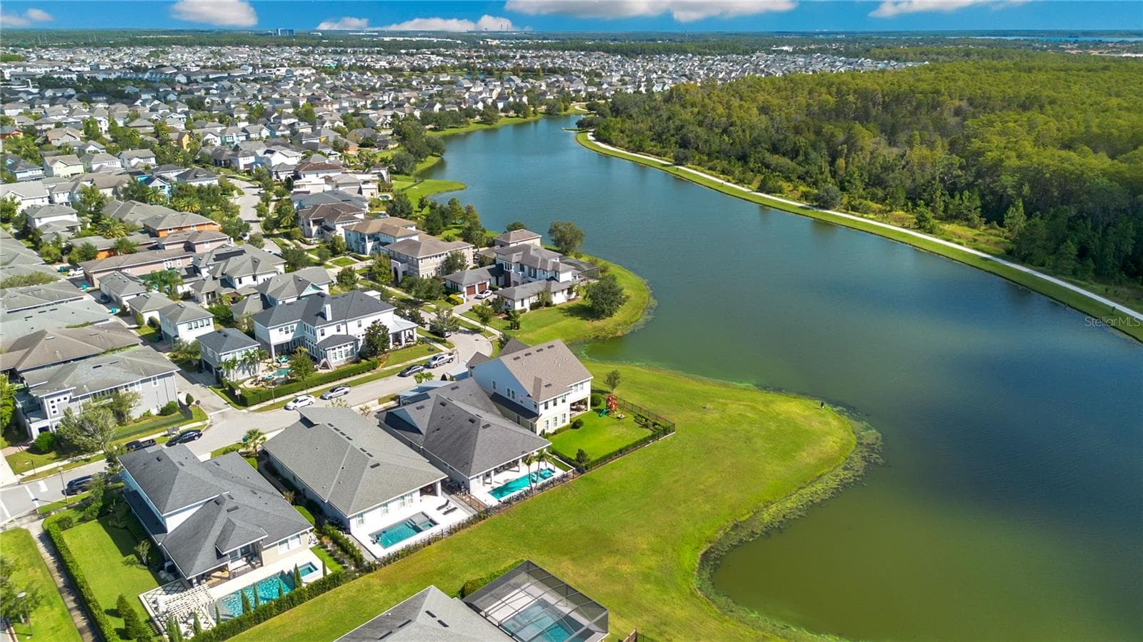 Aerial view of Laureate Park, one of Lake Nona's most sought after communities, with lakes, trails, and parks. - 8336 CANETTI ST, ORLANDO