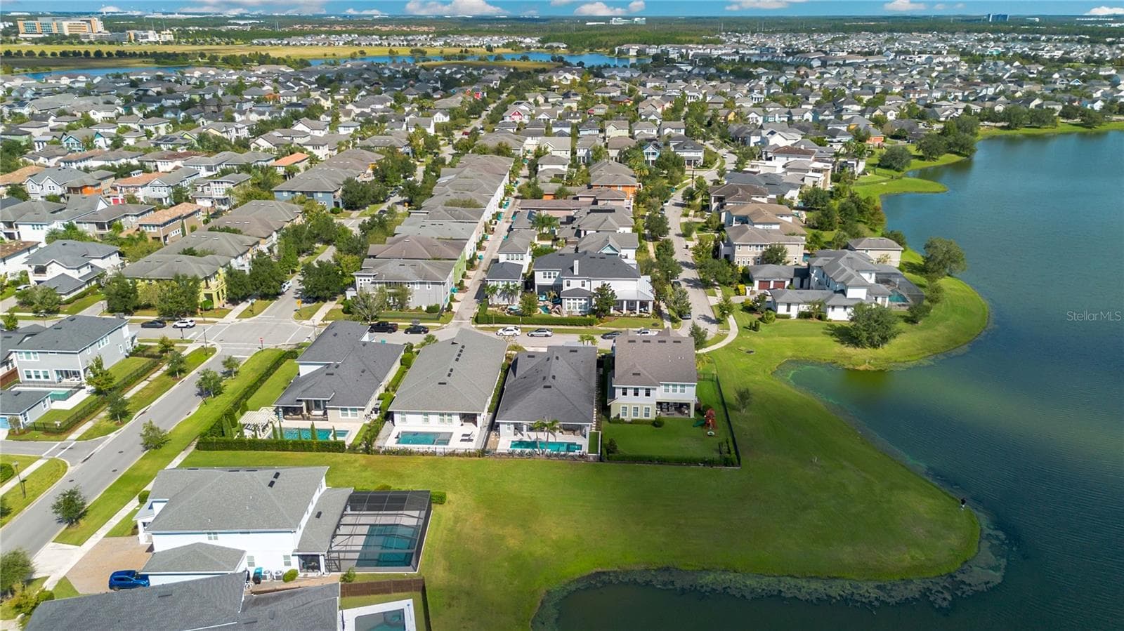 Laureate Park community aerial with community pool, fitness center, dog parks, pickleball, and tennis nearby. - 8336 CANETTI ST, ORLANDO