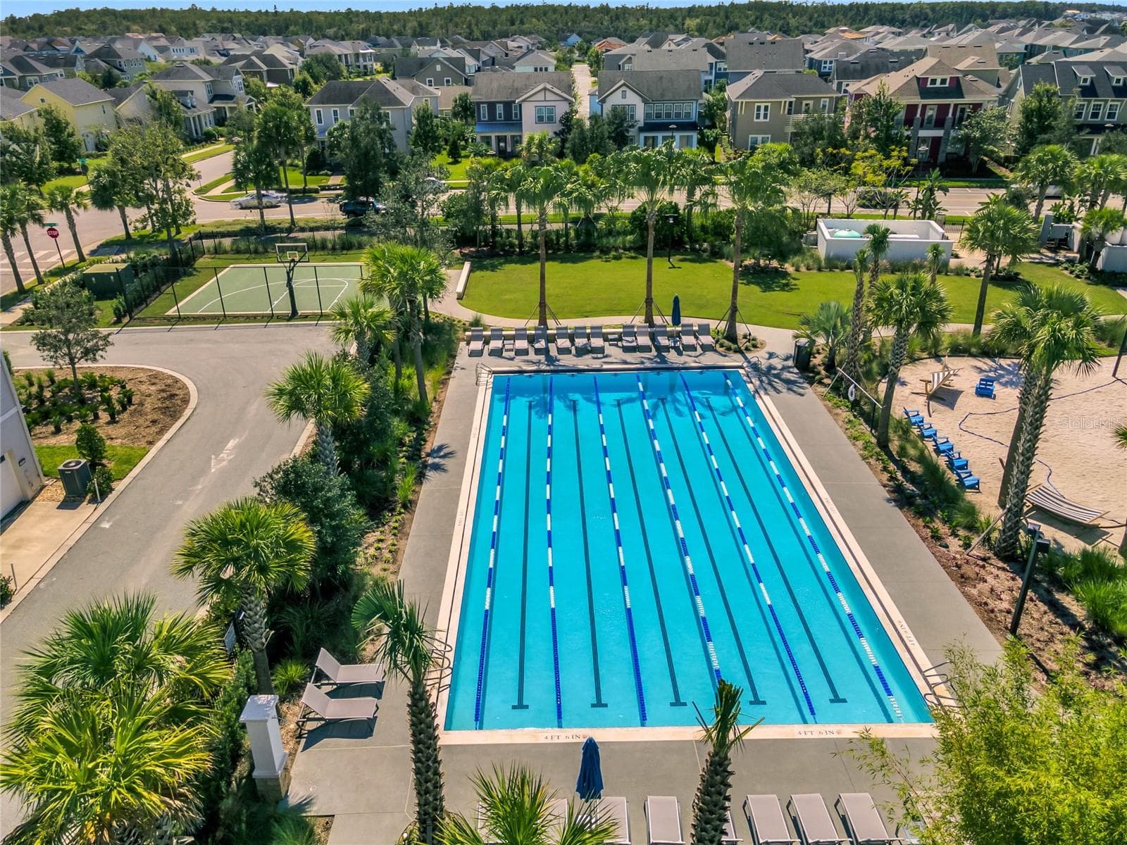 Laureate Park lap pool for fitness swimming, part of the community's resort style amenities. - 8336 CANETTI ST, ORLANDO