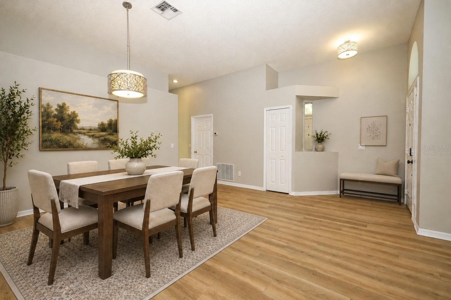 Dining Room & Foyer Virtually Staged - 3581 FOXCROFT CIR, OVIEDO