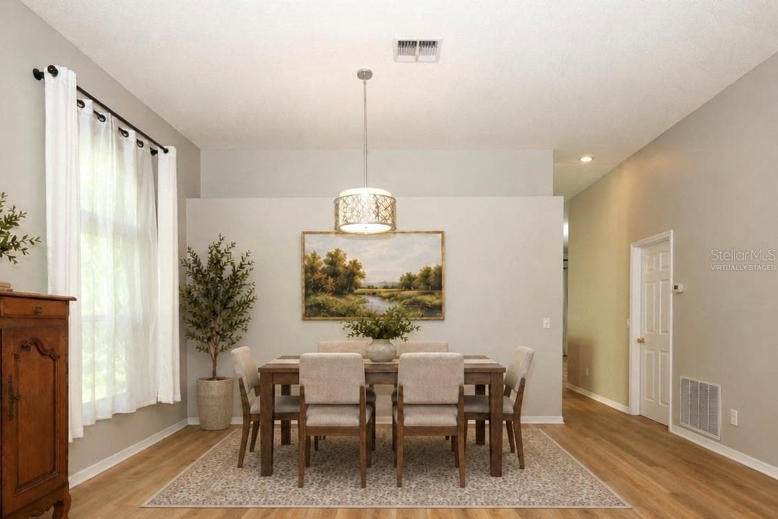 Dining Room Virtually Staged - 3581 FOXCROFT CIR, OVIEDO