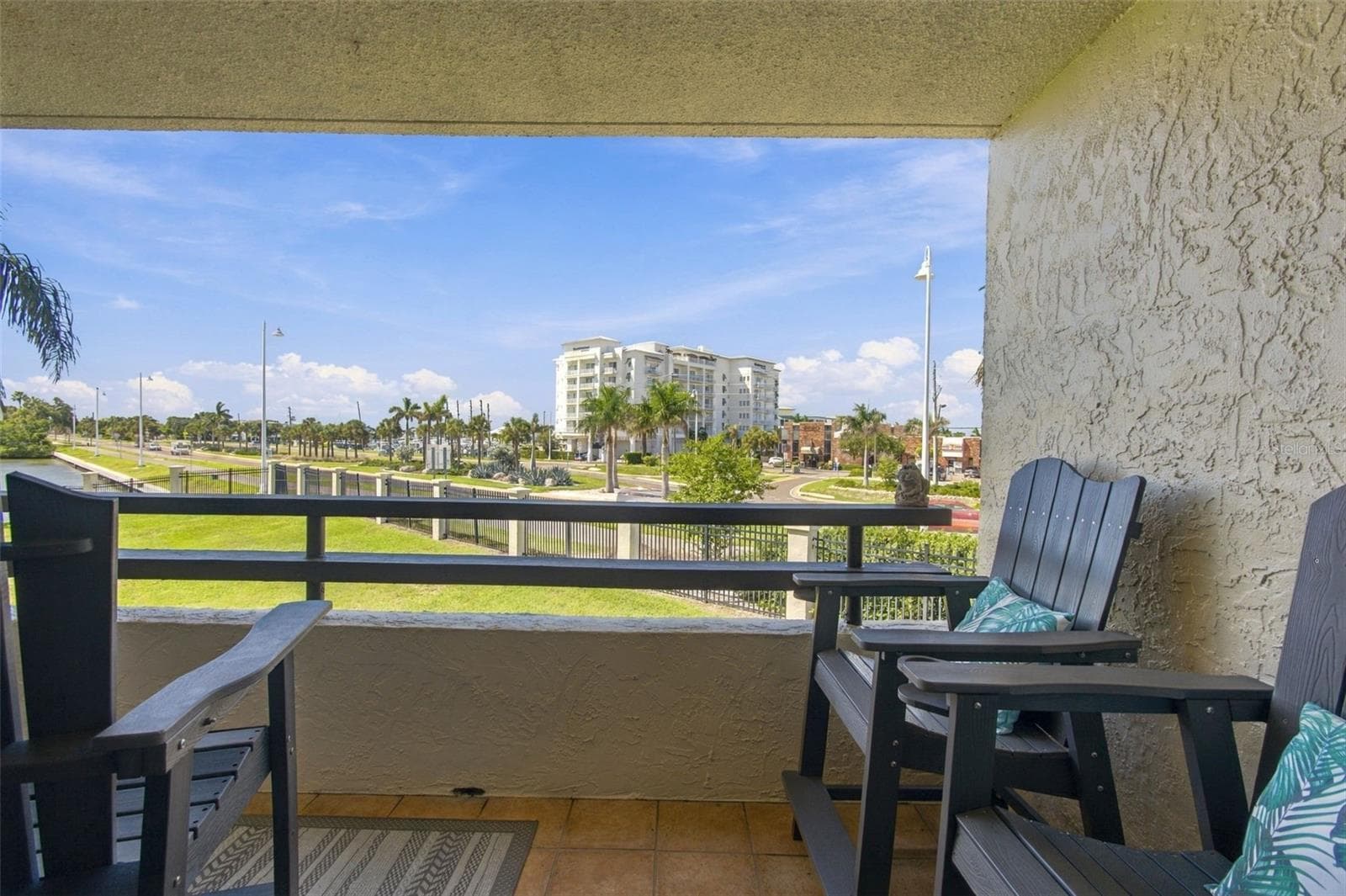 Balcony off or family room and primary BR - 106 1ST ST E #116, TIERRA VERDE