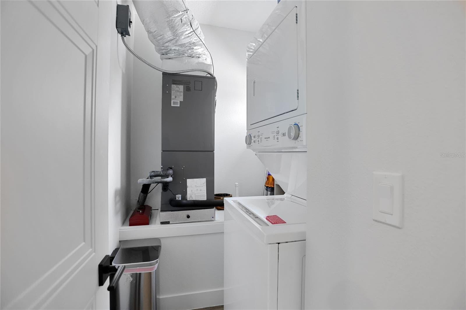 Laundry in In-Law Suite above Garage - 728 GARDEN WEST TER, WINTER GARDEN