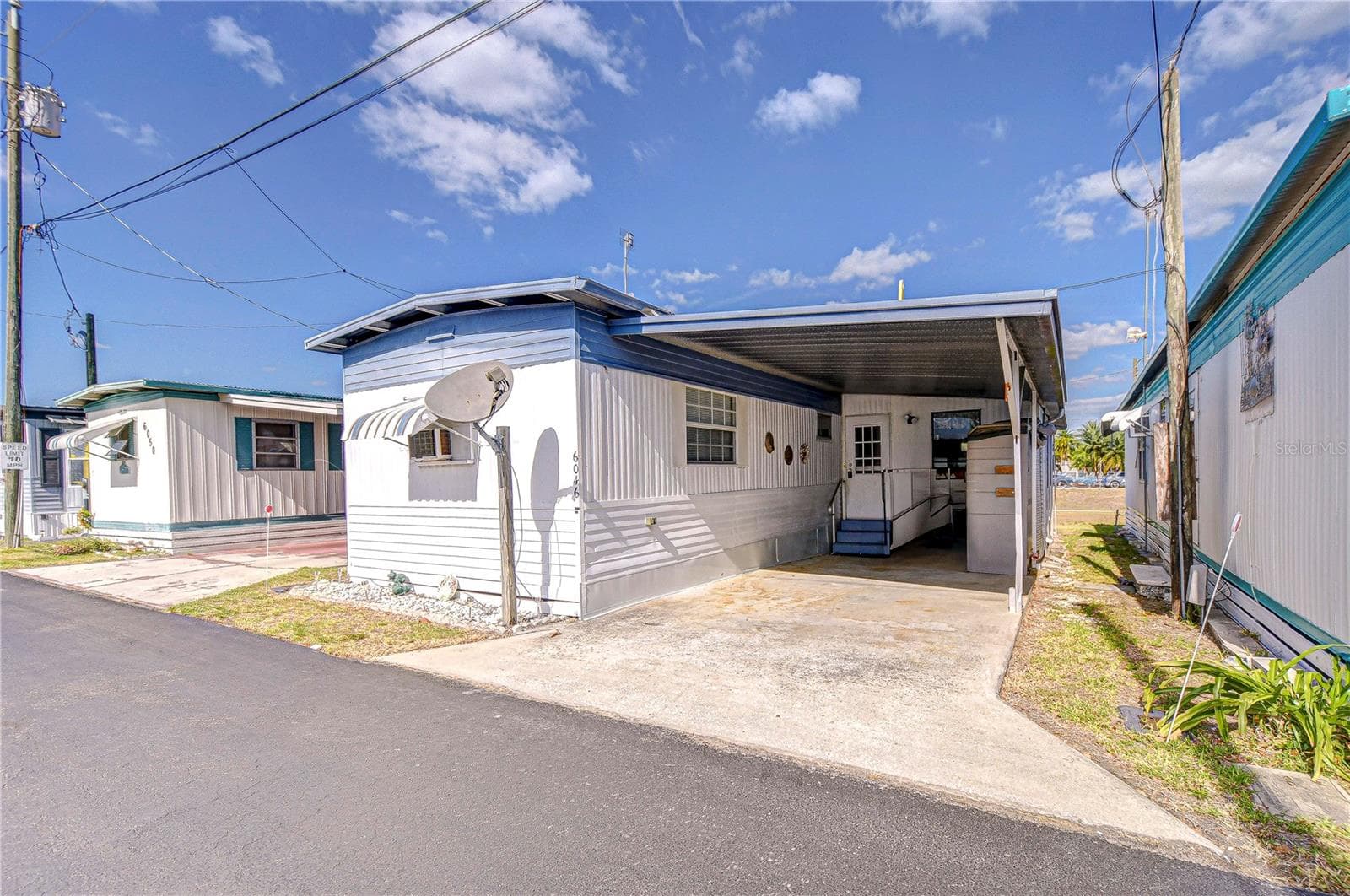 Mobile Home at 6046 HARRIET ST, ZEPHYRHILLS, photo 2 of 31