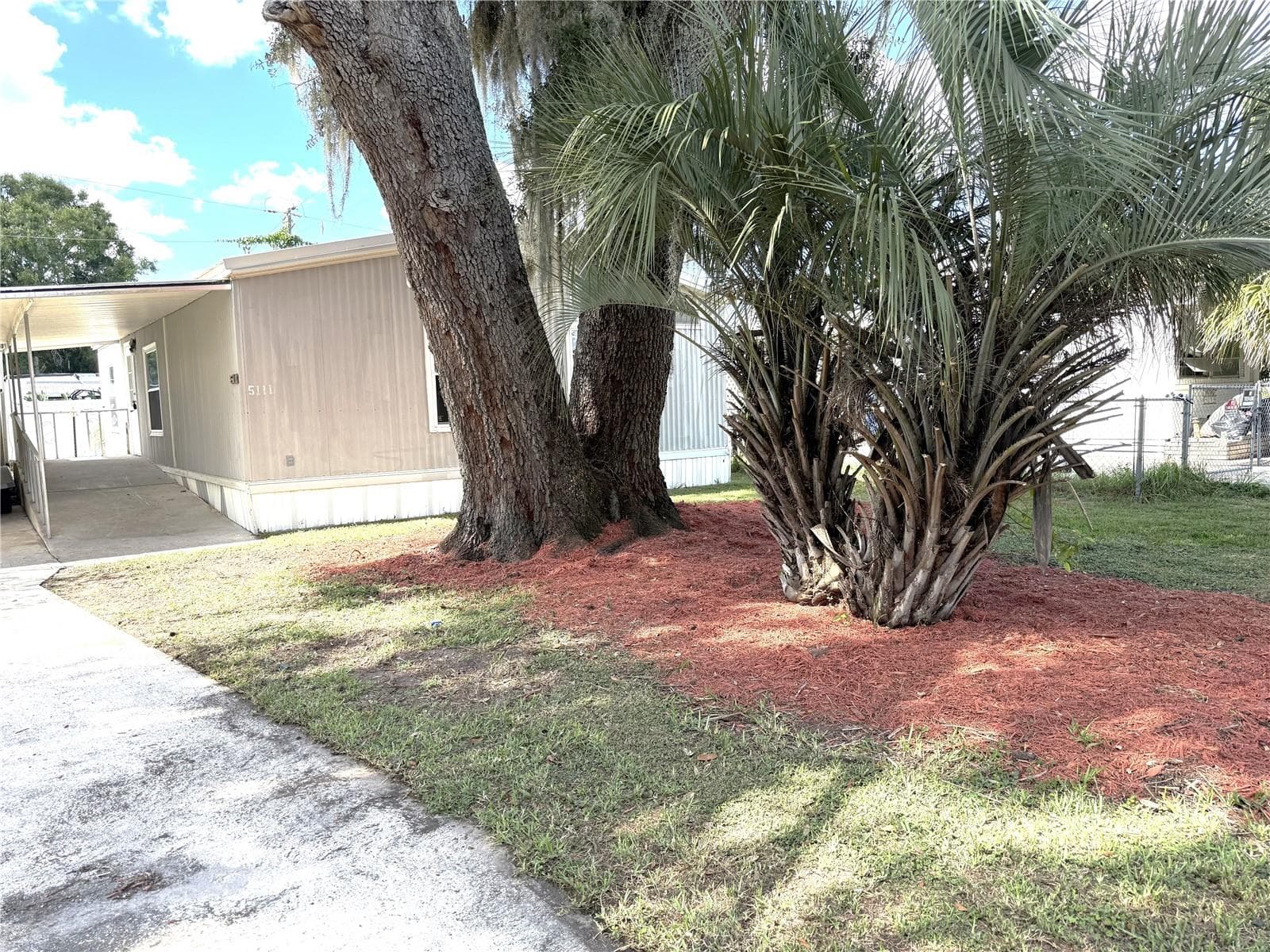 Carport View - 5111 HILL DR, ZEPHYRHILLS