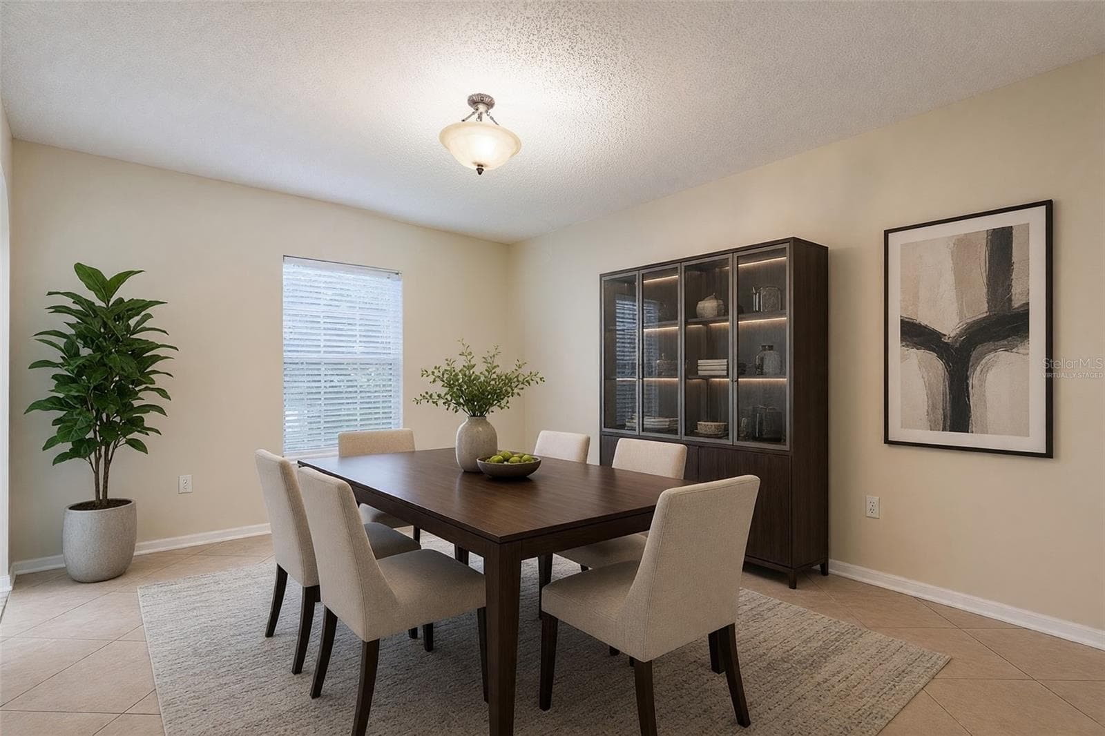 VIRTUALLY STAGED DINING ROOM - 2457 ELKCAM BLVD, DELTONA