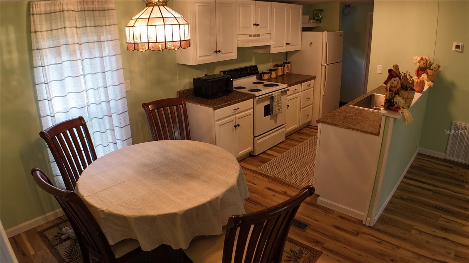 Manufactured Home at 10851 NE 110TH LN, ARCHER, photo 7 of 28