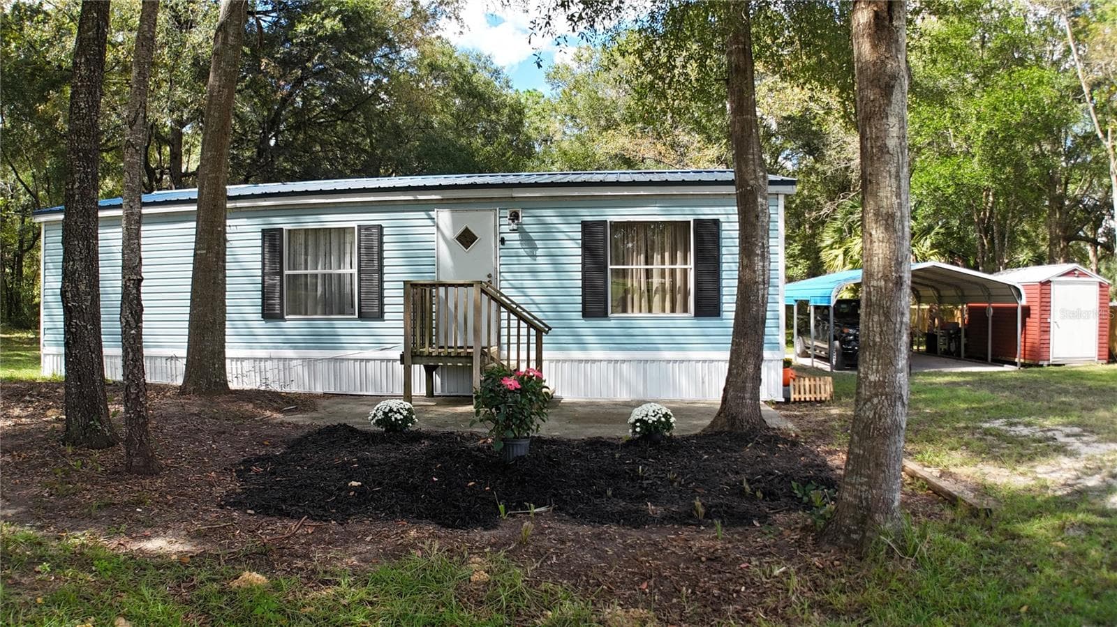 Manufactured Home at 10851 NE 110TH LN, ARCHER, photo 25 of 28