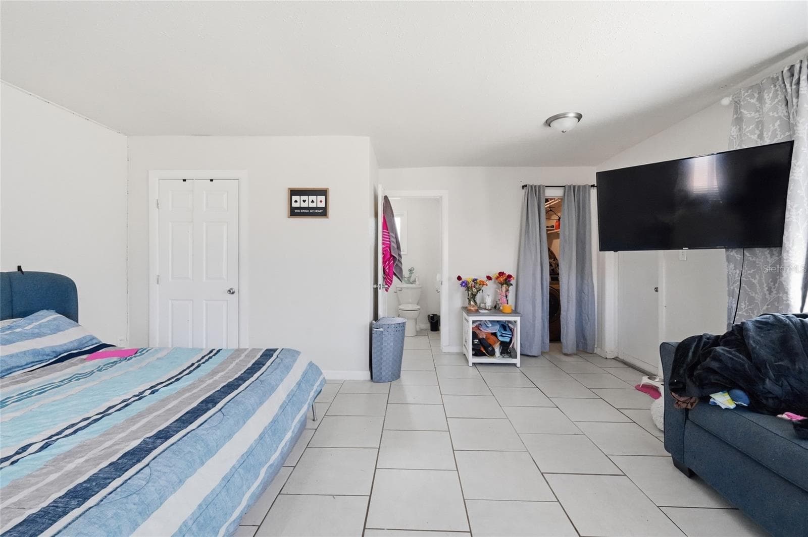 Primary bedroom 2420 with 1/2 bath and laundry - 2418 51ST AVENUE DR W, BRADENTON