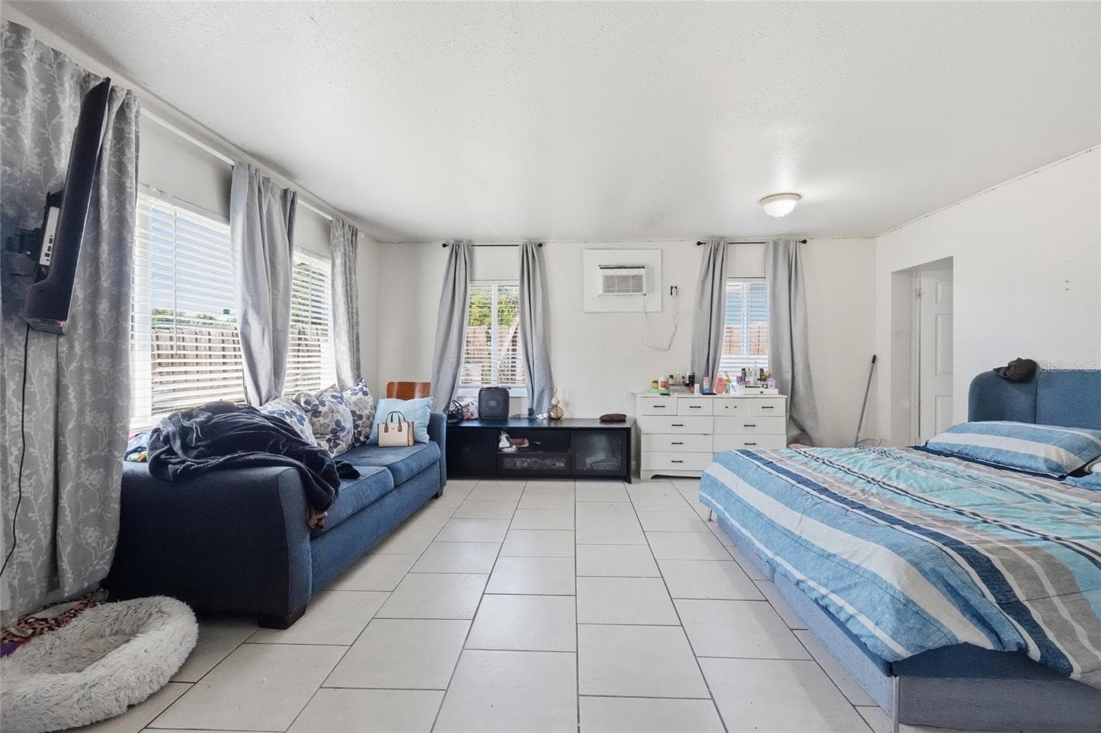 Primary bedroom 2420 with 1/2 bath and laundry - 2418 51ST AVENUE DR W, BRADENTON