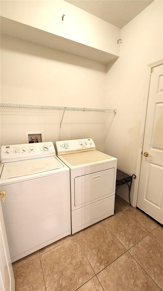 Inside Laundry Room off Kitchen and from Garage. - 642 SPRING LAKE CIR, TARPON SPRINGS