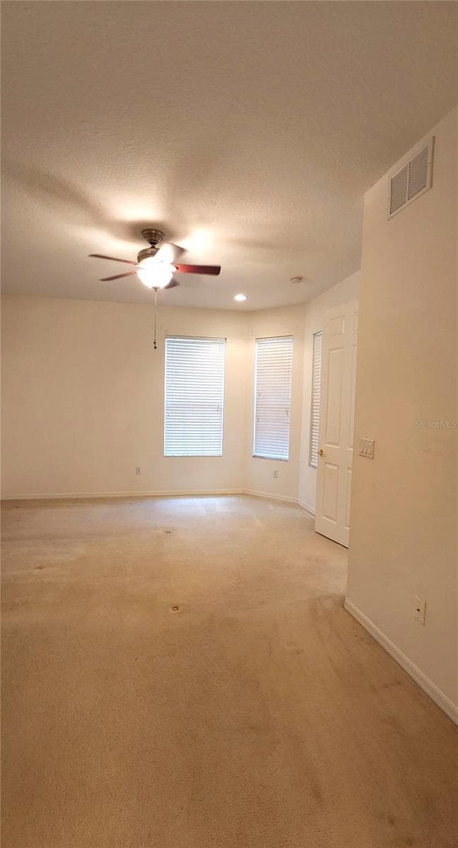 Primary bedroom on ground floor. - 642 SPRING LAKE CIR, TARPON SPRINGS