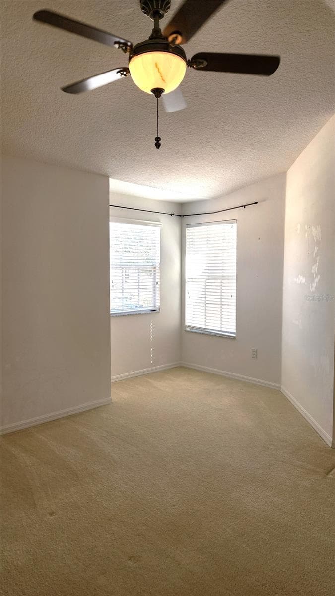 Large 2nd Bedroom facing front of home. - 642 SPRING LAKE CIR, TARPON SPRINGS