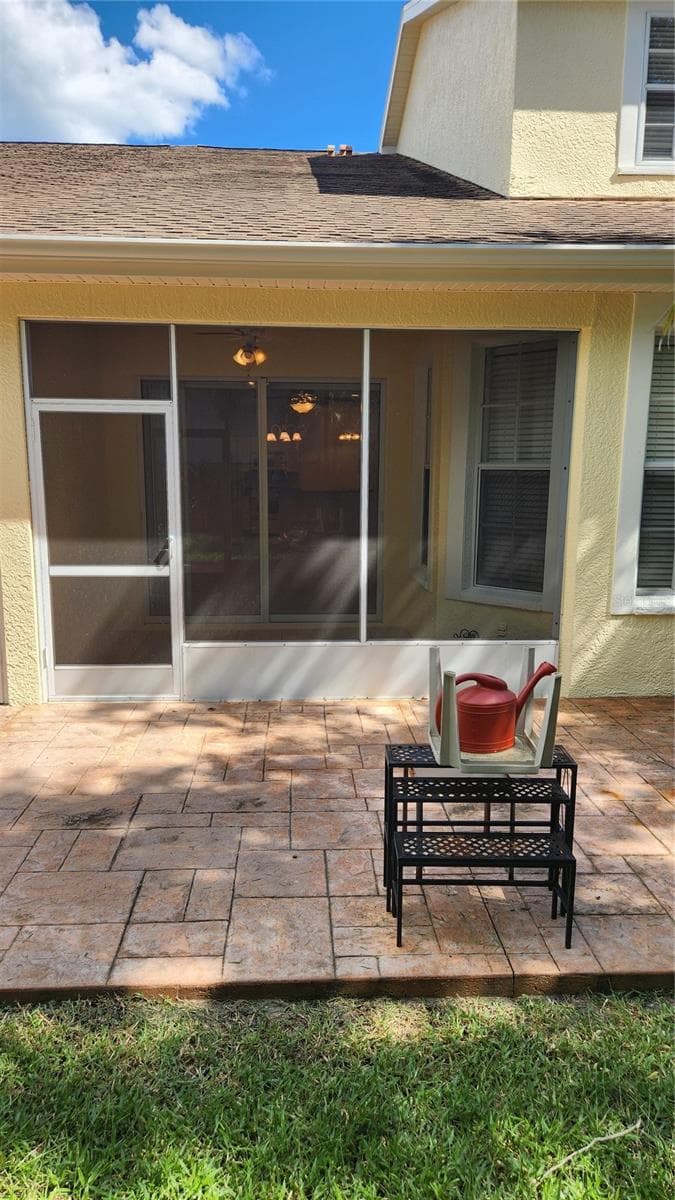 View of rear of unit. - 642 SPRING LAKE CIR, TARPON SPRINGS