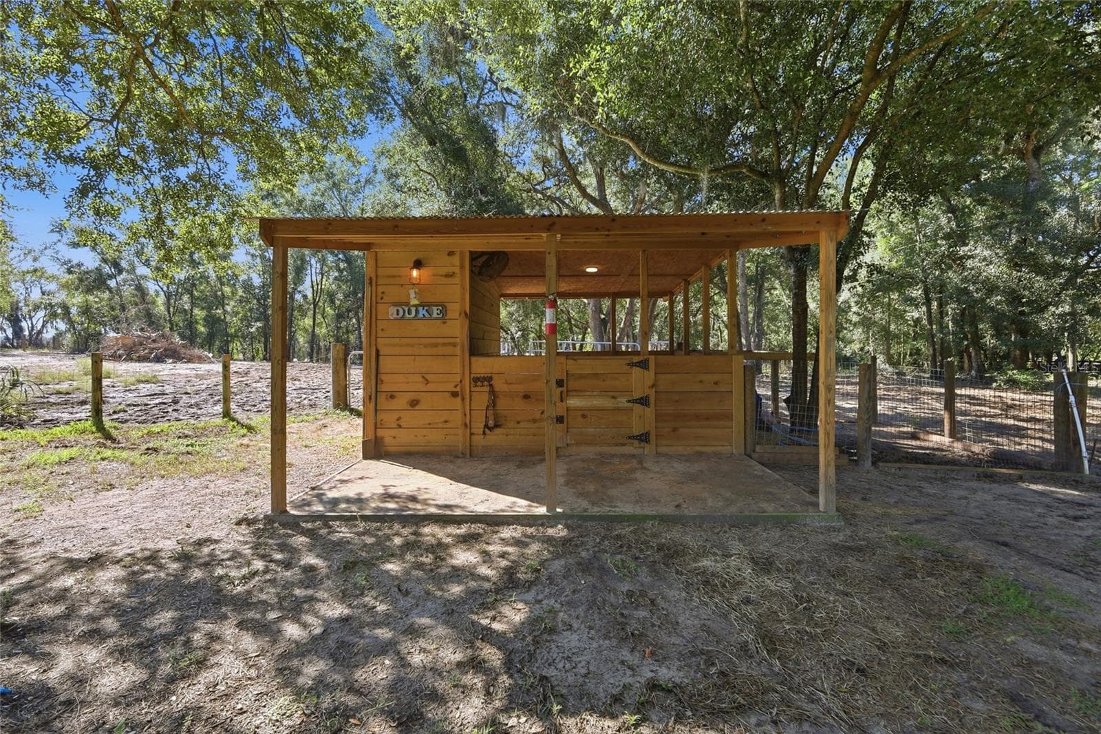 1 horse stall with storage, water & electricity. Attached to 1 of 3 large fenced in areas - 2138 LAKE ELLA RD, FRUITLAND PARK