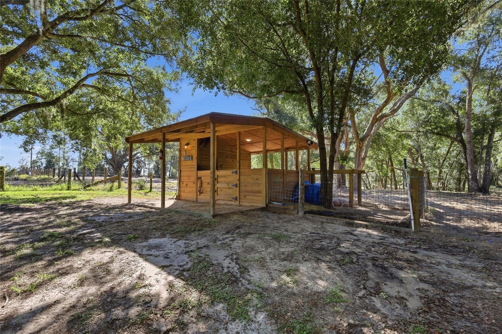 1 horse stall with storage, water & electricity. Attached to 1 of 3 large fenced in areas - 2138 LAKE ELLA RD, FRUITLAND PARK