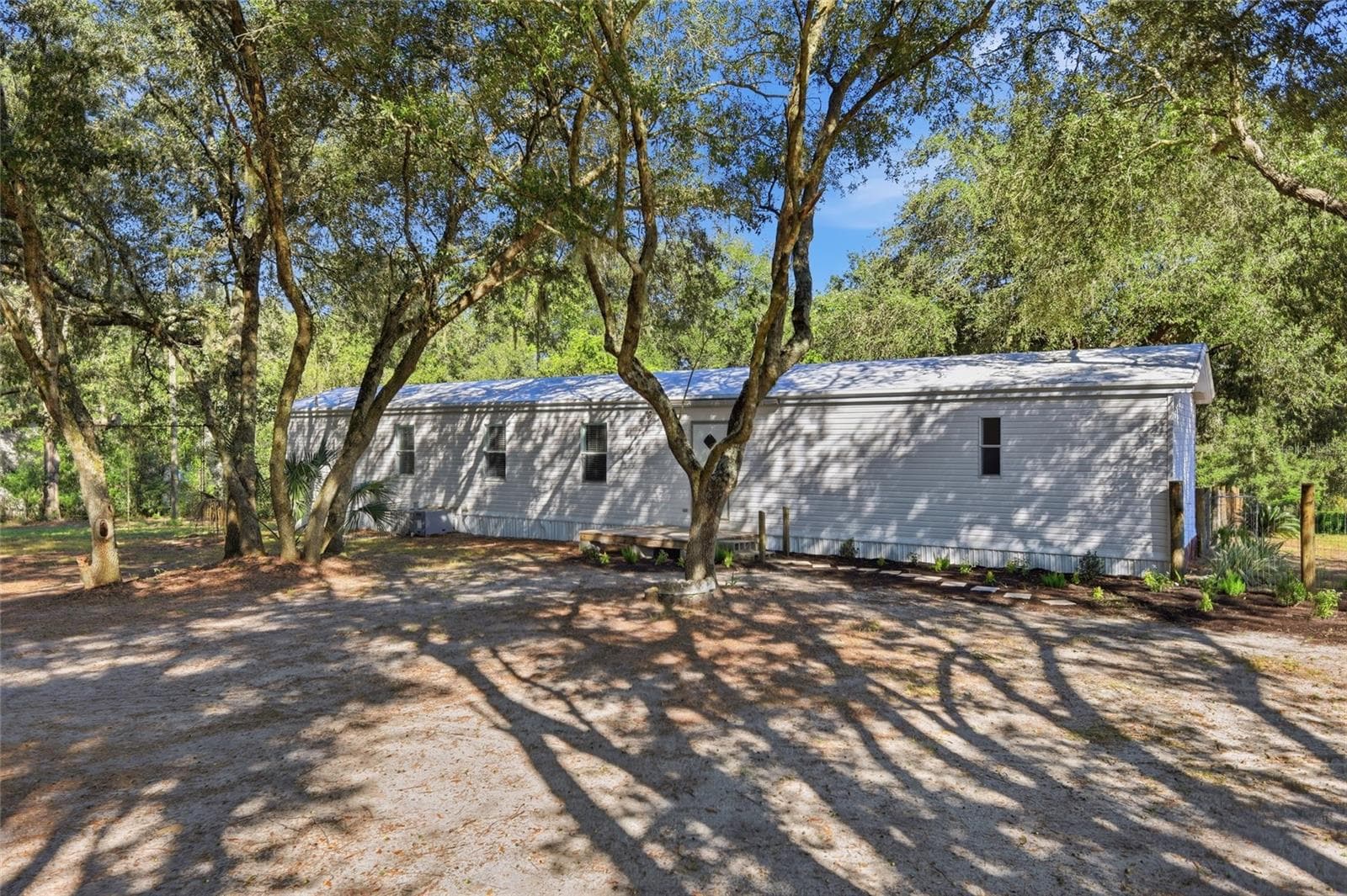 Back of home - 2138 LAKE ELLA RD, FRUITLAND PARK