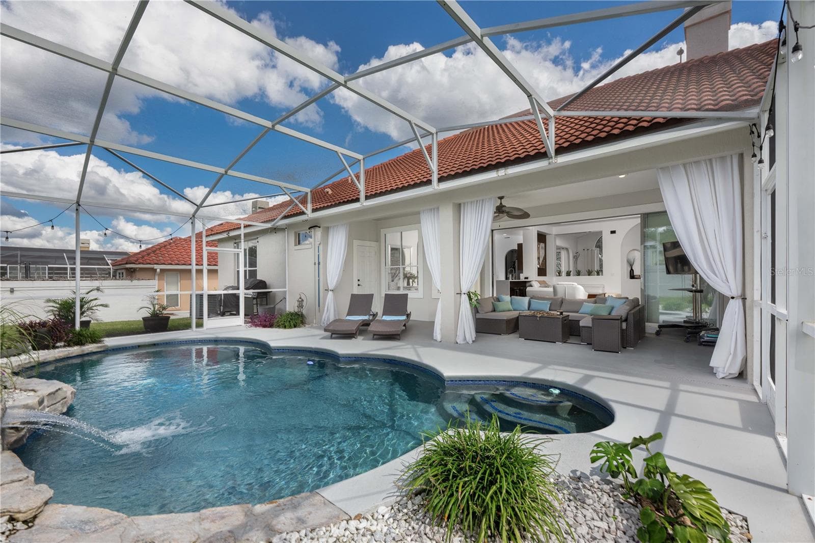 Spacious backyard oasis featuring a relaxing salt pool. - 1854 VISTA ROYALE BLVD, ORLANDO