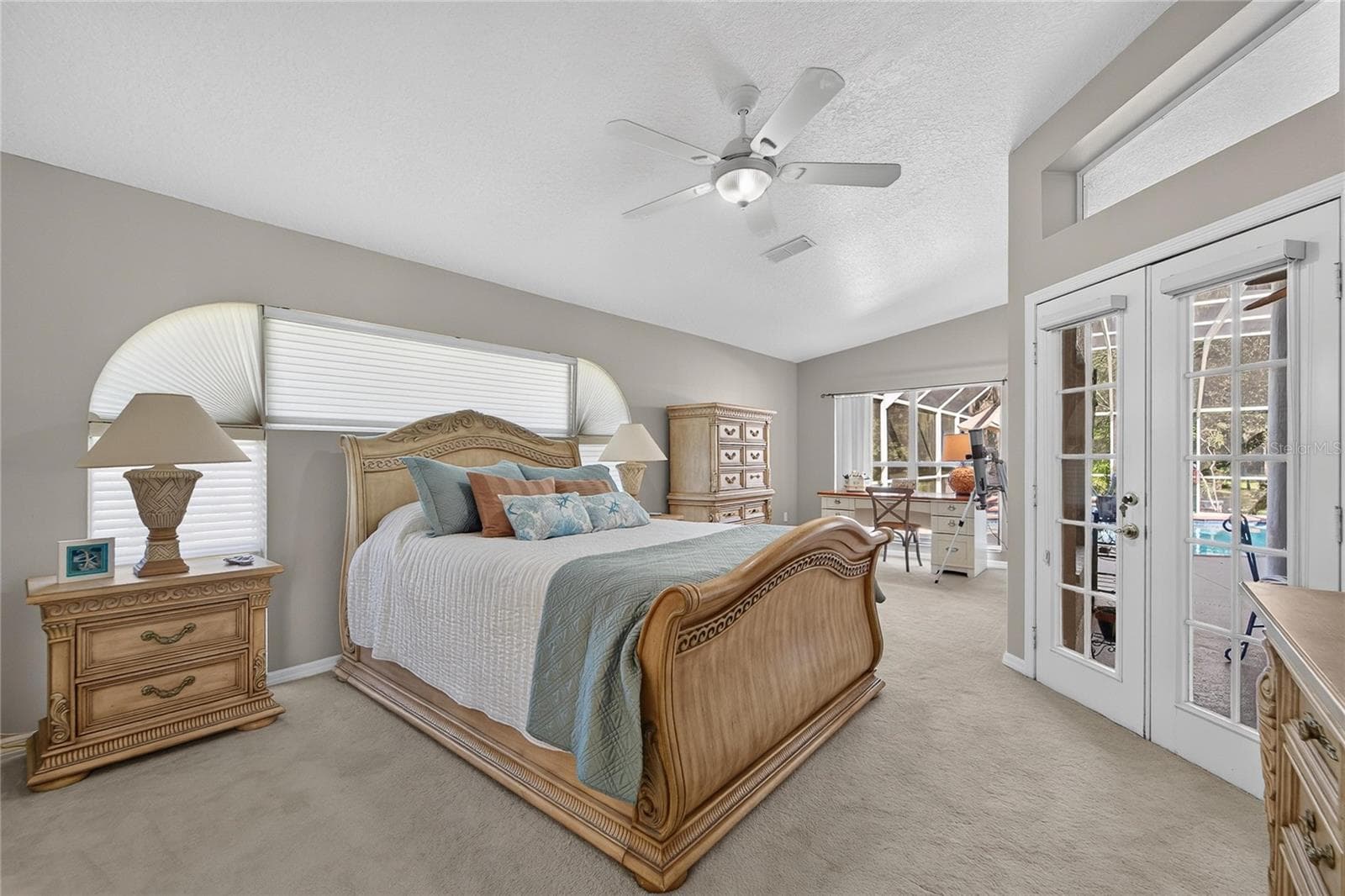 Primary bedroom has French doors to the pool - 0 OLCOTT DR, WESLEY CHAPEL