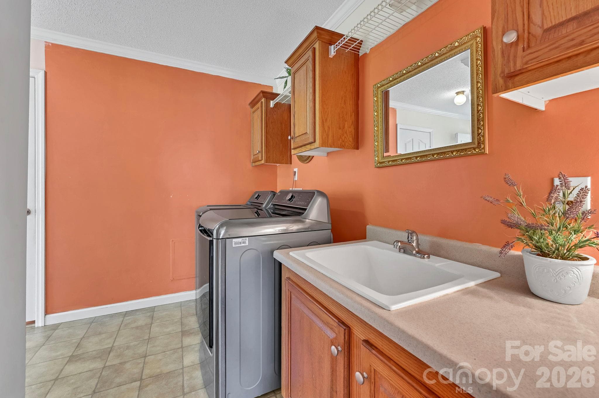 Mudroom Laundry room with door to side yard - 85 Hidden Meadow Drive, Candler