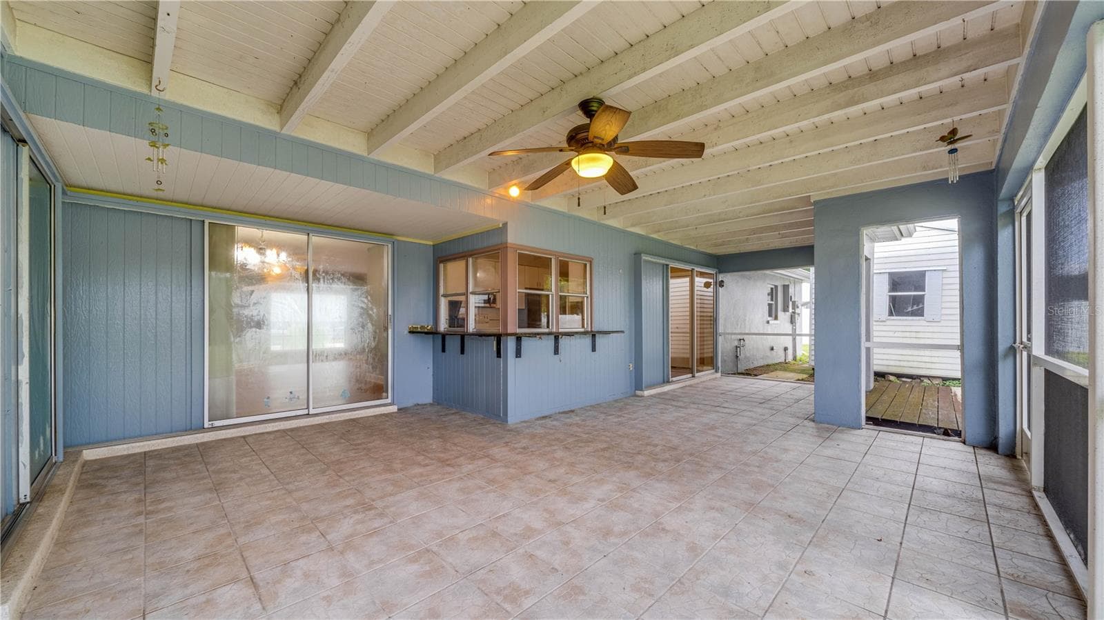 All 3 sets of sliders are pocket sliders providing open air living. The shed offers electric and is elevated. - 909 SE 27TH ST, CAPE CORAL