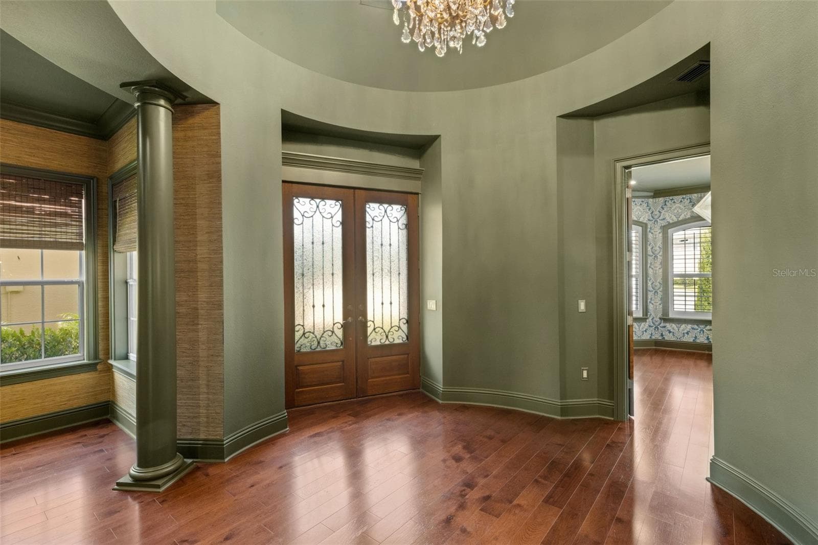 From the moment you step inside through the custom wood double doors to the signature rotunda foyer . . . - 2734 BELLERIVE DR, LAKELAND