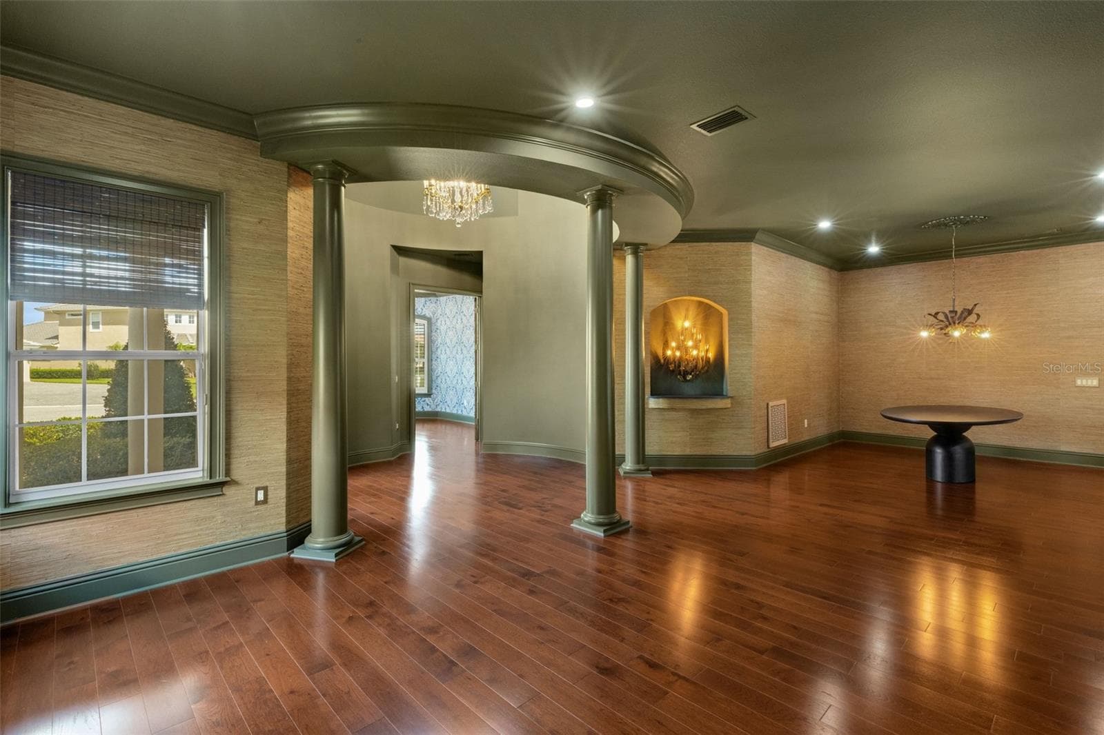 With gleaming wood flooring throughout, 12' ceilings and dramatic "one of a kind" architectural elements. - 2734 BELLERIVE DR, LAKELAND
