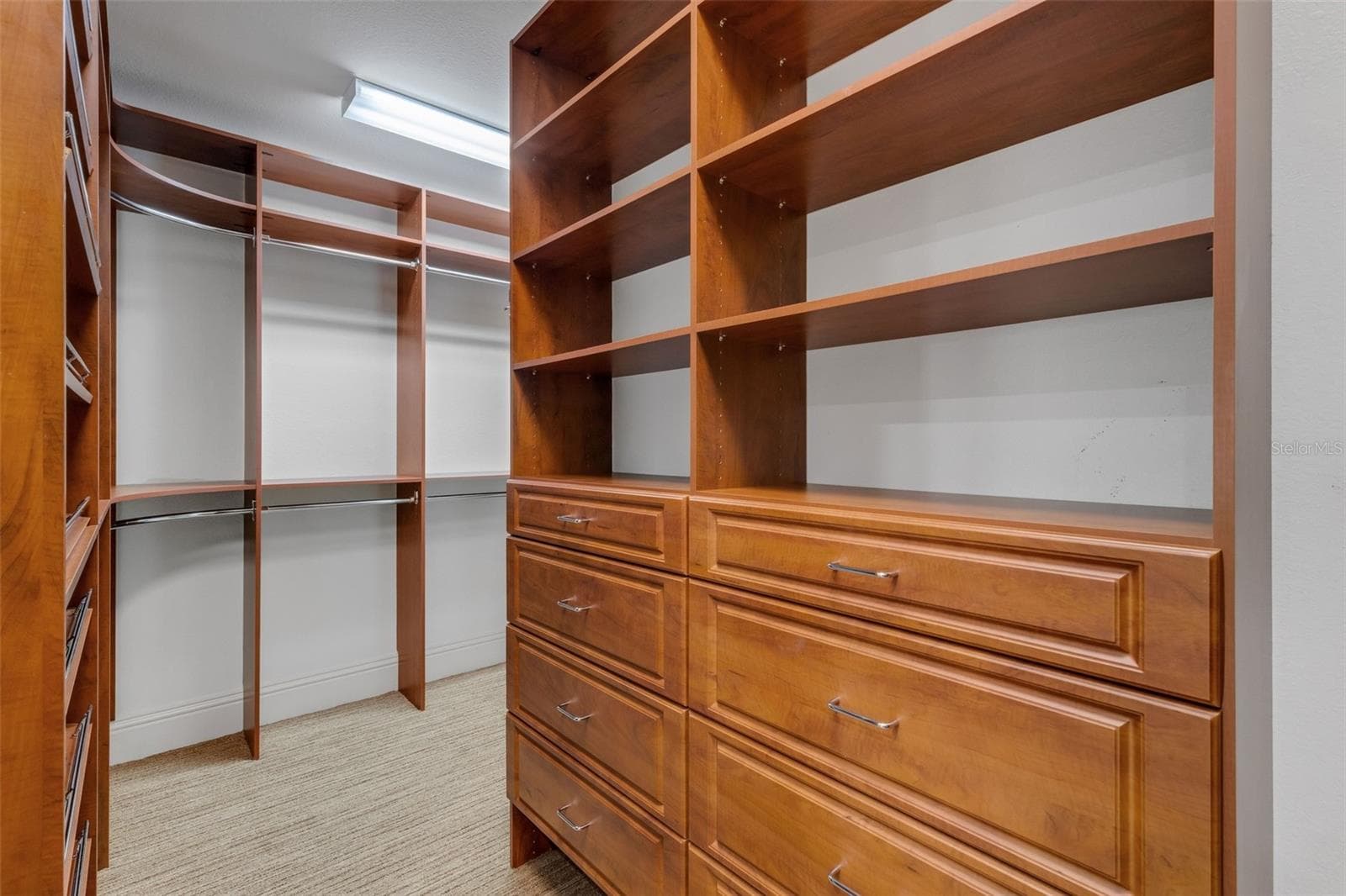 There are TWO spacious walk-in closets with custom organizer systems . . . - 2734 BELLERIVE DR, LAKELAND