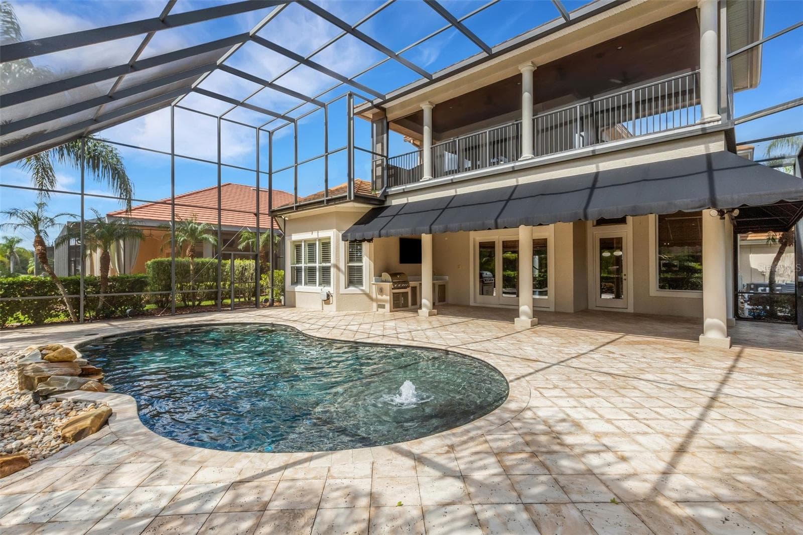 Travertine decking all around. - 2734 BELLERIVE DR, LAKELAND