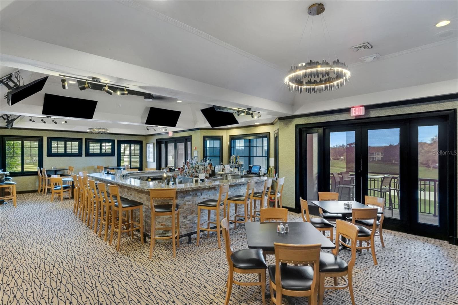 a sports bar where members can relax and unwind after golf, tennis or pickleball. - 2734 BELLERIVE DR, LAKELAND