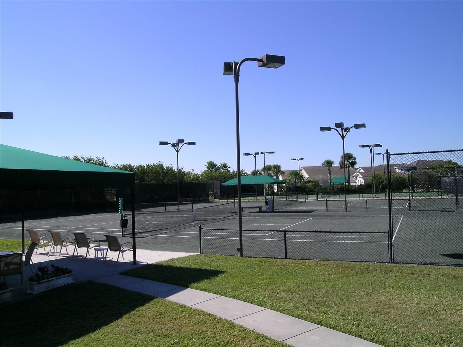 with 5 soft courts for tennis and 4 pickleball courts. - 2734 BELLERIVE DR, LAKELAND